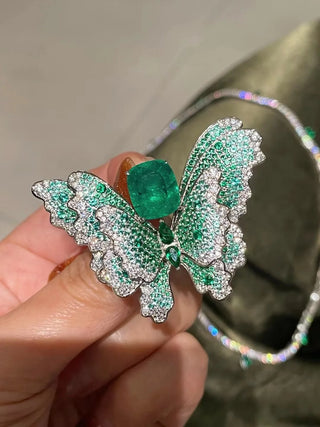 Butterfly of Eden Necklace with green lab sapphire in butterfly design on sterling silver snake chain – nature-inspired sapphire necklace for women