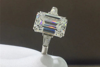 Dynastia Ring with D-grade Moissanite and Moissanite side stones in 925 sterling silver