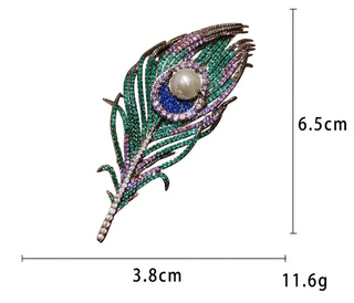 Noble Peacock Feather Brooch – copper-silver alloy with freshwater pearl and multicolored lab sapphires in green, blue, and purple.