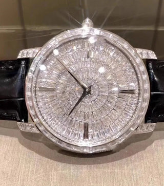 The Meridian Diamond Watch featuring a red 32 mm dial, silver case, and sapphire crystal window.