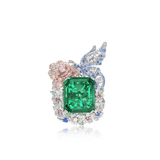 Wizard of Oz Butterfly Ring in sterling silver with a lab-created sapphire, surrounded by delicate butterfly wings adorned with shimmering side stones. A magical and enchanting piece.
