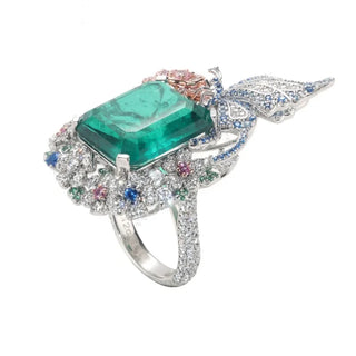 Wizard of Oz Butterfly Ring in sterling silver with a lab-created sapphire, surrounded by delicate butterfly wings adorned with shimmering side stones. A magical and enchanting piece.
