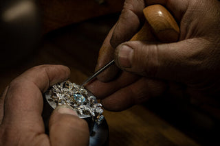 A jewelry ad with eco-friendly claims next to a magnifying glass and fine print, symbolizing scrutiny of greenwashing in marketing.