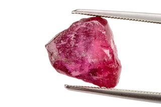 Close-up of a treated gemstone showcasing its enhanced color and clarity.