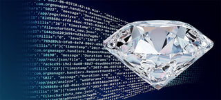 A blockchain ledger displayed on a digital screen next to a diamond under inspection, representing transparent diamond traceability through technology.
