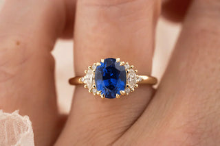 A selection of unique non-diamond engagement rings featuring gemstones like sapphire, moissanite, and emerald—highlighting alternative options that reflect personal style and ethical considerations.