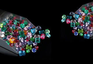 Two gemstones side by side labeled 'lab-grown' and 'synthetic,' with magnifying glass highlighting their visual similarities but different origins.
