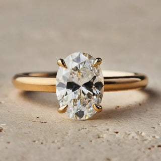Diamond solitaire featuring sharp talon claws holding the stone.