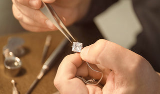 Damaged ring with misplaced stones and visible tool marks beside amateur repair tools—showcasing the risks of DIY jewelry fixes compared to professional craftsmanship.