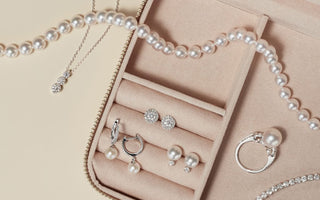 Compact jewelry organizer neatly holding earrings, rings, and necklaces — a stylish storage solution for small spaces.