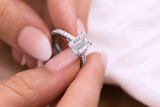 Close-up of a dull platinum ring showing signs of patina next to a polished one for comparison.