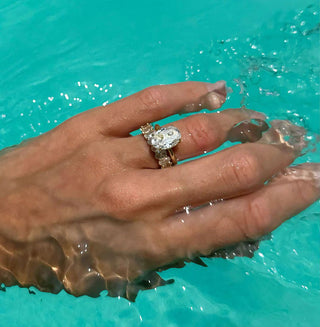 Compact and durable engagement rings displayed in a travel jewelry case, ideal for destination proposals or jet-setting couples. 