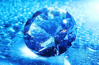 A side-by-side comparison of a lab-grown diamond and a natural diamond under UV light, showcasing fluorescence differences.