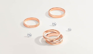 Jeweler inspecting a gold ring with a loupe, illustrating how to evaluate quality jewelry before buying.