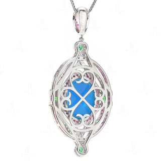 Cameo Blue Diamond Pendant in 925 sterling silver with sculpted agate cameo and a halo of lab-created sapphires in pink, green, and white tones.