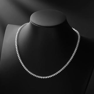 Sterling silver Classic Tennis Necklace with lab sapphires in graduated sizes, designed for elegant styling across day and evening looks.

