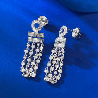 Frostlight Drop Earrings: 925 sterling silver drop earrings for women set with shimmering lab-created sapphire stones.