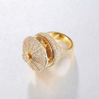 Golden Carnival Ring with spinning carousel crown, pavé-set lab sapphires, and sculpted golden horses, inspired by vintage fair magic

