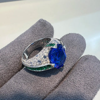 Jewel of the Realm Ring in sterling silver with deep blue and emerald lab sapphires, regal cocktail ring design