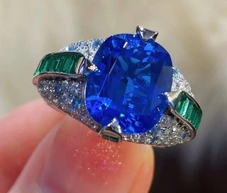 Jewel of the Realm Ring in sterling silver with deep blue and emerald lab sapphires, regal cocktail ring design

