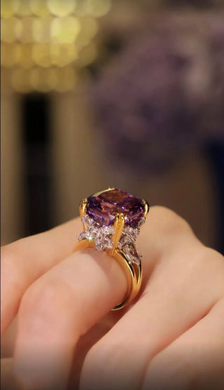 Lavender Spell Ring with a 10-carat purple lab sapphire in a prong setting, crafted in sterling silver with a magical, enchanting cocktail design