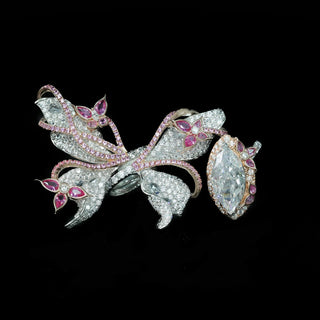 Papillon Pink Ring featuring a delicate butterfly-inspired design with shimmering pink gemstones, showcasing fine craftsmanship and elegant detail.
