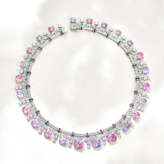 Rosy Mirage Necklace and earrings suite in pink and purple tones, featuring lab sapphires and a choker design with silver-copper finish.

