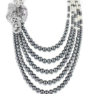 Élan de Perle Layered Necklace in sterling silver with black and white pearls, accented by lab-created sapphires.