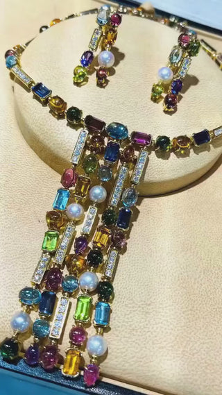 Glintfall Necklace with five-layer tassel drop design, crafted from 925 sterling silver and adorned with lab-created sapphires. A shimmering, elegant necklace that captures light and movement.