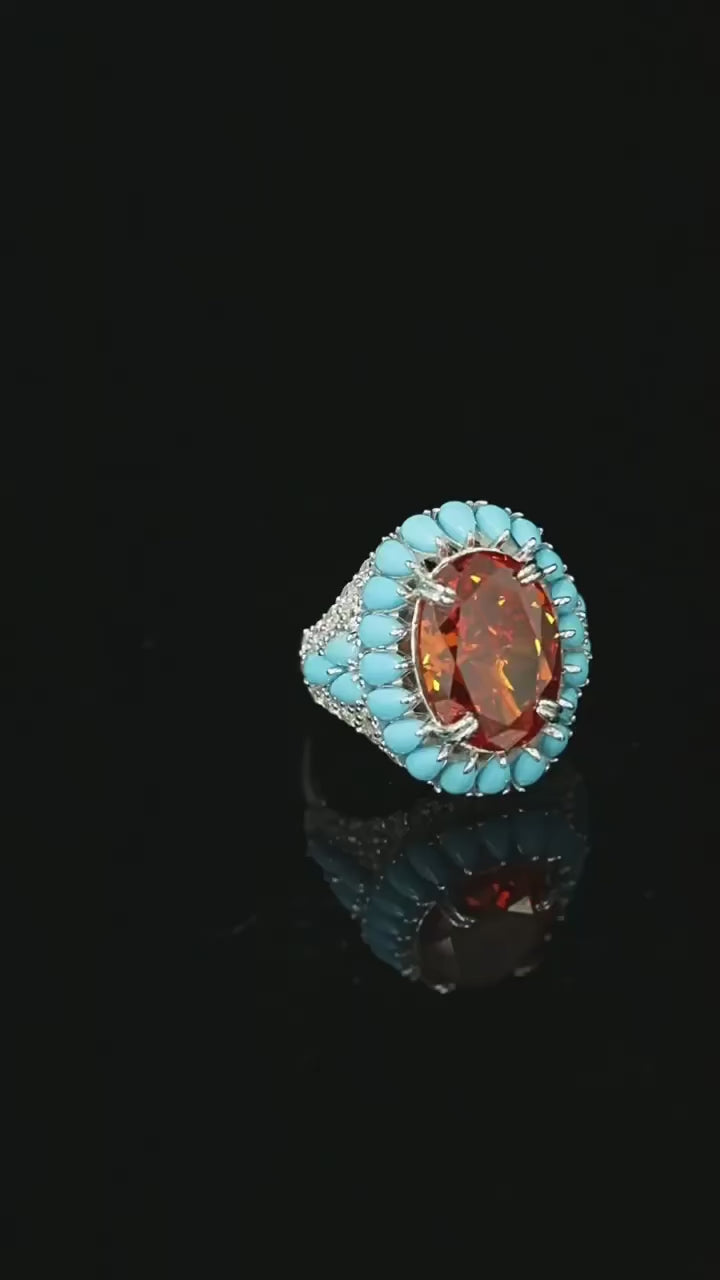 Azzallure Fire and Frost Ring in sterling silver featuring a fiery orange lab sapphire center, surrounded by icy turquoise and lab sapphires—unisex cocktail ring with elemental contrast.