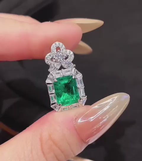 Imperial Ivy Earrings in sterling silver with emerald lab sapphires, capturing elegance and the spirit of resilience.