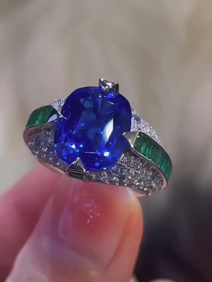 Jewel of the Realm Ring in sterling silver with deep blue and emerald lab sapphires, regal cocktail ring design