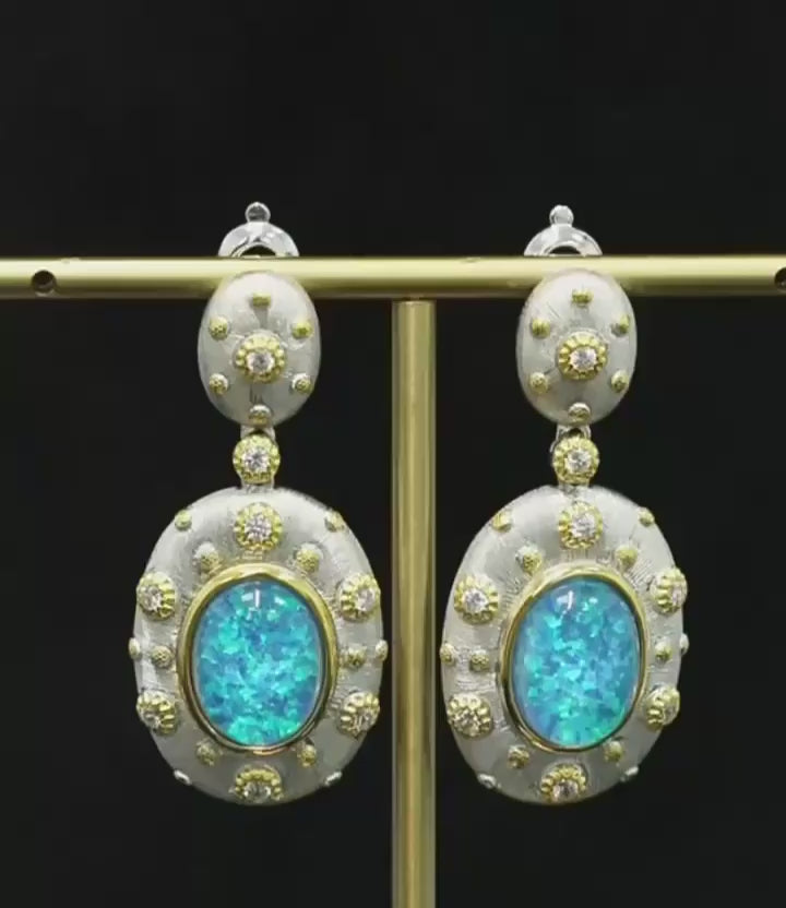 Opaline Skies Earrings in sterling silver with lab-created sapphires, offering a soft, serene glow for an elegant look.